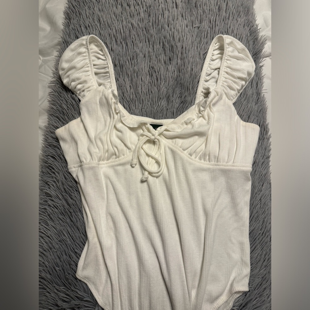 Women’s white ribbed babydoll ruffle trim blouse